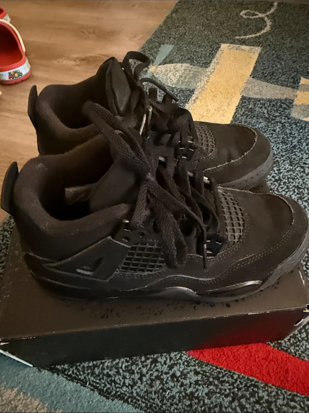 Jordan 4’s All-Black Retro Sneakers